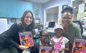 Picture of Courtney, Alex, and KeyKey from our staff with an adorable patient.